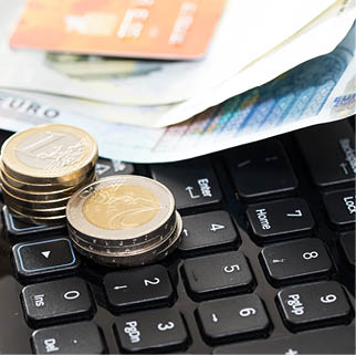 Money and bank card on the keyboard